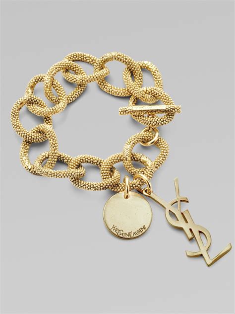 yves saint laurent bracelet or|the saint lauren ladies braclets.